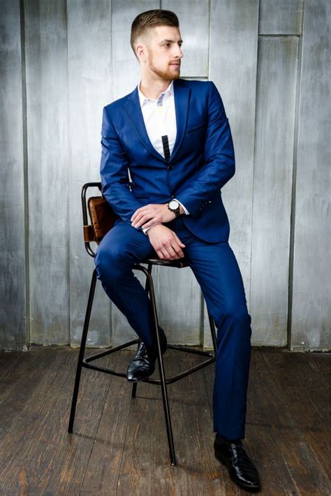 blue suit and black shoes|blue suit with brown shoes.